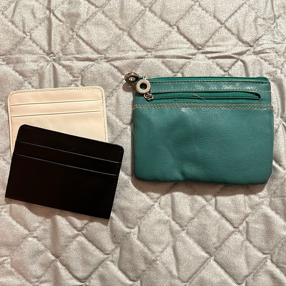 Small teal pocket wallet with black and white inserts